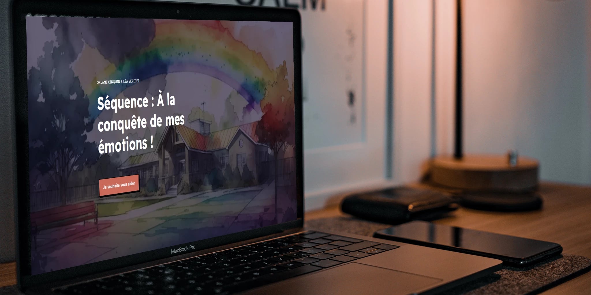 Laptop displaying webpage in French about emotional growth, with smartphone and tablet on desk