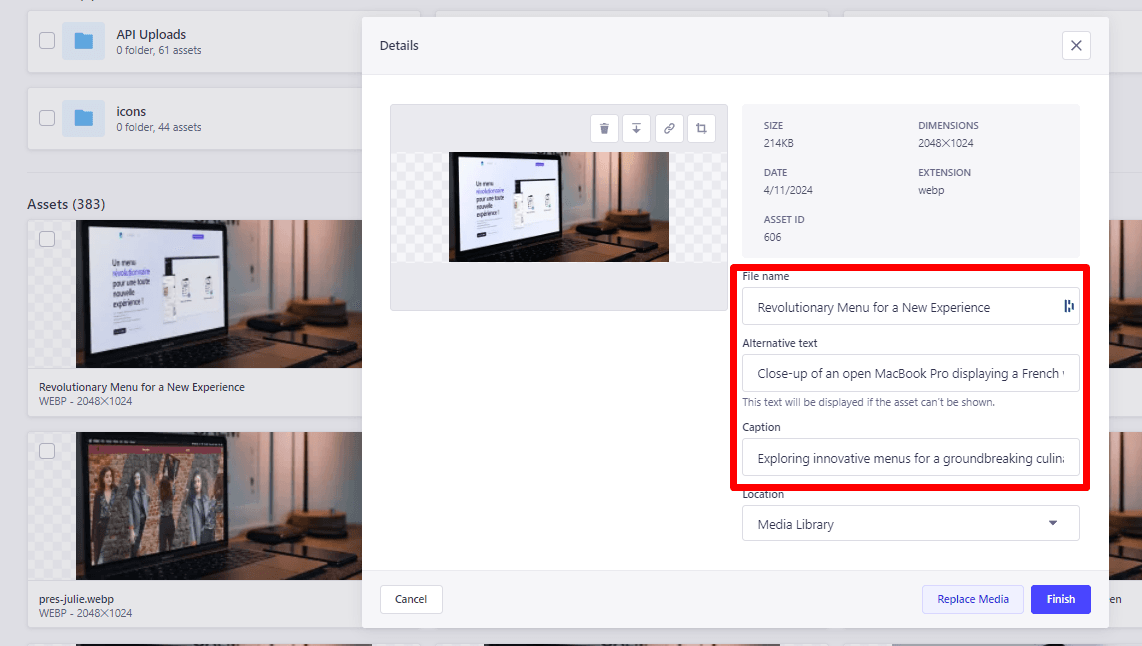 Close-up of an open MacBook Pro displaying a French menu in a digital asset management interface